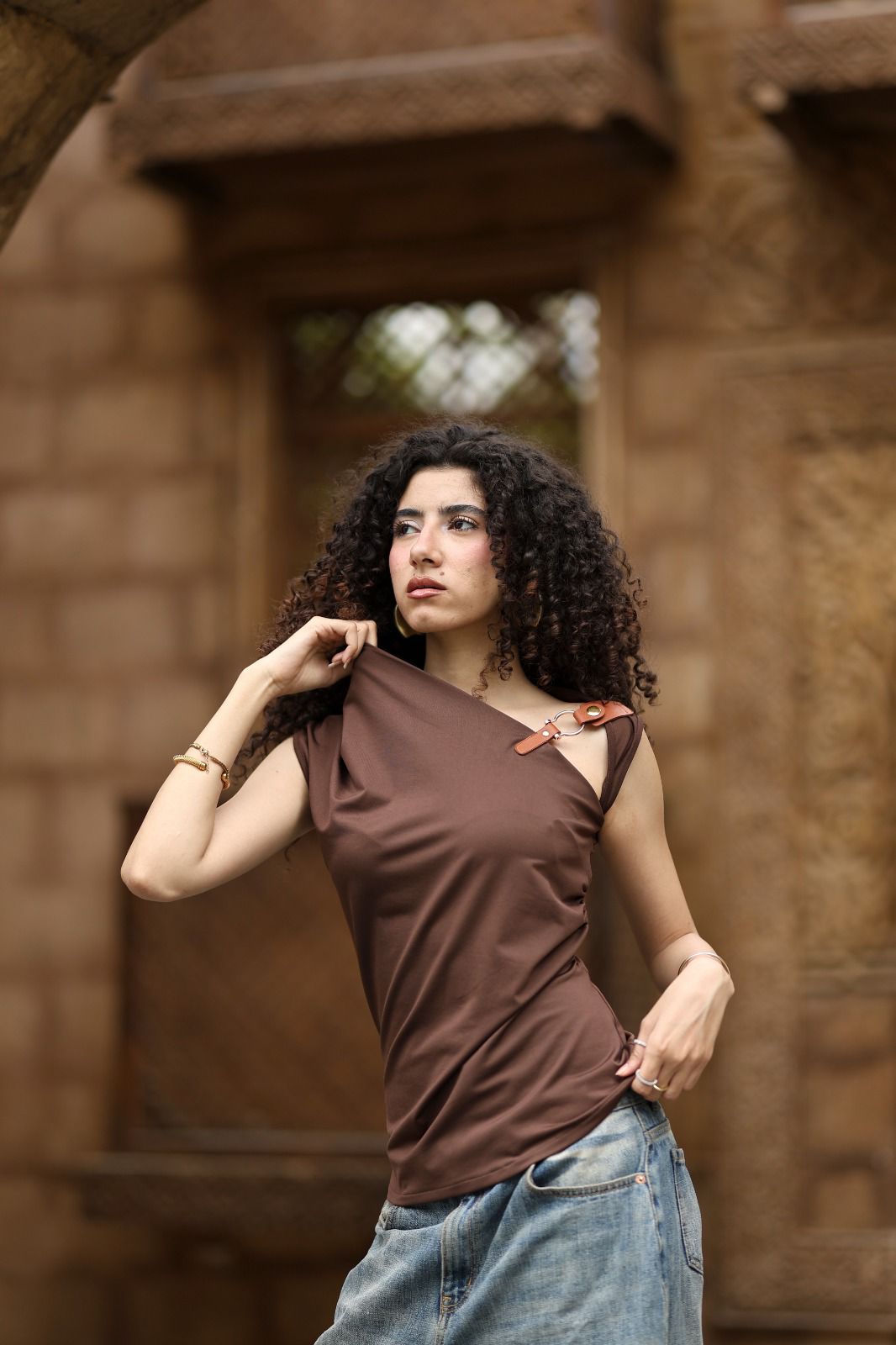 Brown statement buckle top